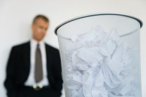 Photo Of Trash Can Filled With Receipts