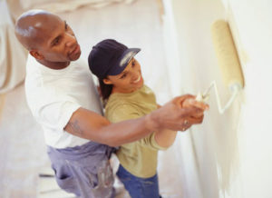 Photo Of Couple Painting Interior Of House