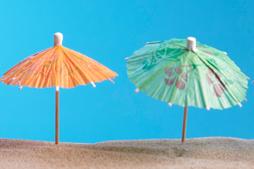 Two umbrellas on a beach
