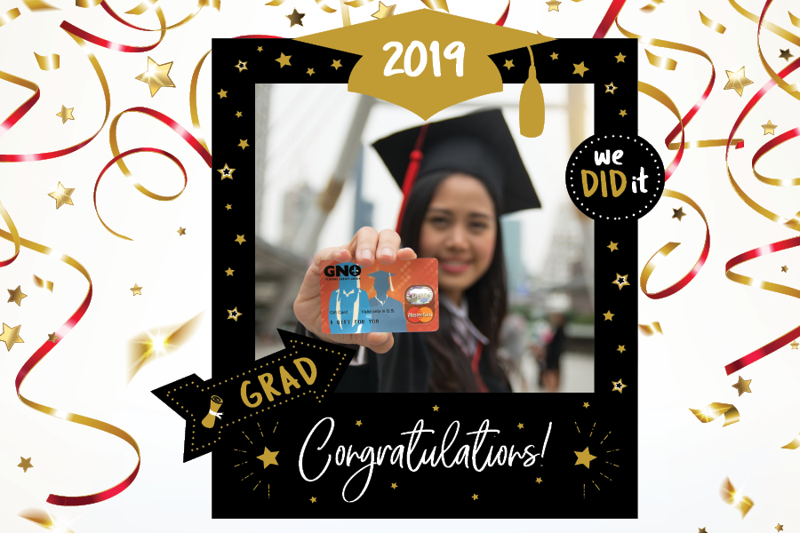 Picture of a graduate holding a GNO Graduation themed Mastercard Gift Card